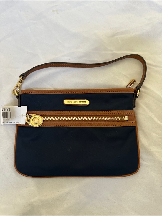 Michael Kors Handbags - Michael Kors Navy and Tan Zip Wristlet